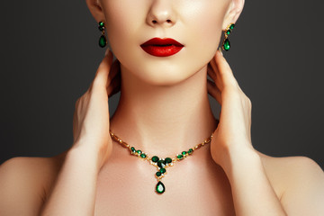 Elegant fashionable woman with jewelry. Beautiful woman with a sapphire necklace. Beauty young...