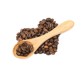 Heart shaped pile of coffee beans isolated