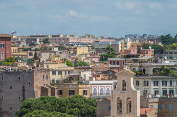 Naklejka premium The Roman Forum is a plaza surrounded by many ruins of ancient government buildings in the center of Rome