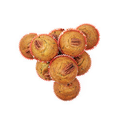 Pile of pecan nut cupcakes isolated