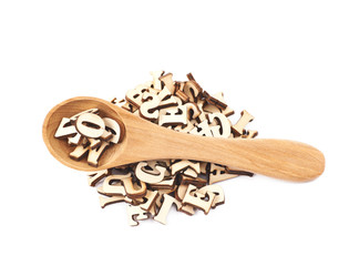 Pile of wood carved letters isolated