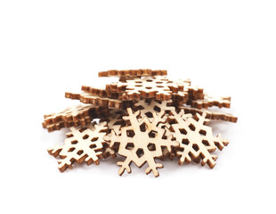 Pile of decorational wooden snowflakes