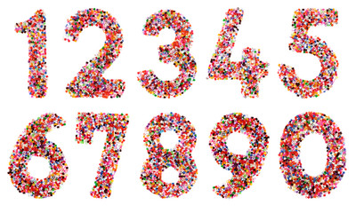 Numbers 1, 2, 3, 4, 5, 6, 7, 8, 9 performed by plastic colorful particles  isolated on a white background. Collage of  my downscaled pictures.