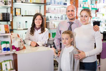 Family in the pharmacy