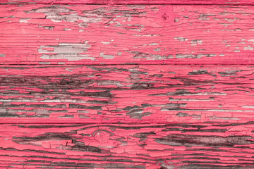 surface texture of the boards with the old pink paint