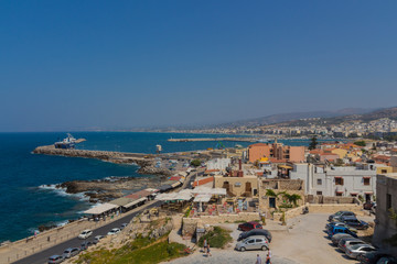 Fototapeta na wymiar Rethymno, Greece - July 30, 2016: Panoramic view to Rethymno fr