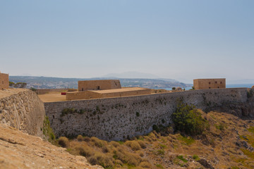 Fototapeta na wymiar Rethymno, Greece - July 30, 2016: The Fortezza of Rethymno.
