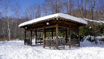 Snow and wooden pavilion environment in the forest Noboribetsu o