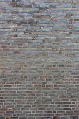 dunkle vertikale Steinwand Textur