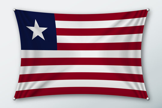 Liberia national flag. Symbol of the country on a stretched fabric with waves attached with pins. Realistic vector illustration.