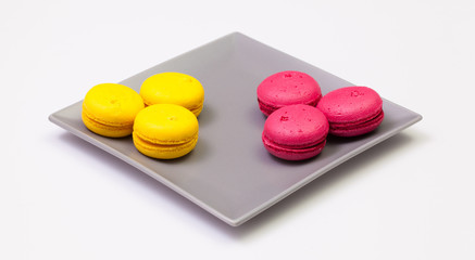 Traditional french colorful macarons on the plate