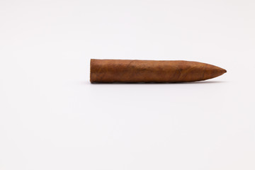 Luxury Cuban cigar on the white table