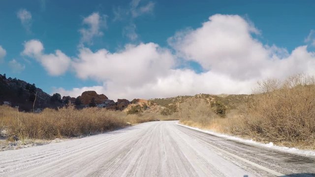 POV point of view - Driving through Garden of the Gods on late morning in the Winter