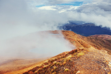 Thick fog on the mountain pass Goulet. Georgia, Svaneti. Europe.
