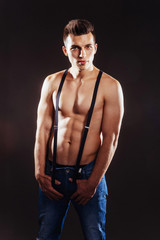 Fototapeta na wymiar Portrait of a man with nude torso fitness standing