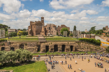 Fototapeta na wymiar The Roman Forum is a plaza surrounded by many ruins of ancient government buildings in the center of Rome
