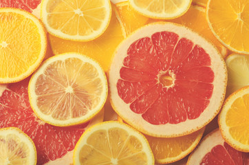 Fototapeta na wymiar Citrus fruit slices of lemon, orange, grapefruit for background.