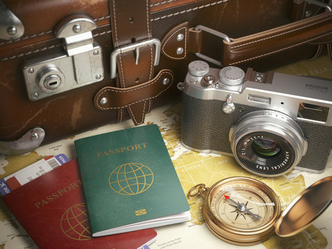 Travel or turism background concept.  Old  suitcase,  passports