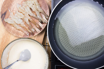 Chef preapred shrimp before frying
