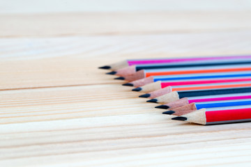 Pencils on a wooden table. Back to school
