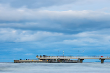 Concrete pier in Kolobrzeg, long exposure shot at sunset