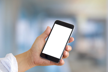 Man hands holding blank screen a smartphone and attract background.