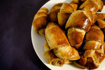 Homemade pastries - croissants on a dark background