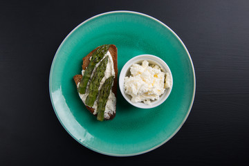Single sandwich with cream cheese and asparagus
