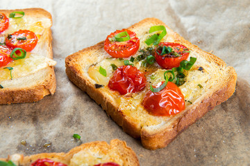 Grilled toast with camembert and cherry tomatoes