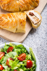 Chicken breast in french pastry with fresh salad
