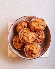 Gluten free  carrot muffins with raisin in a bowl