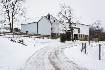 Snow covered road and barn, near Jefferson, Pennsylvania.