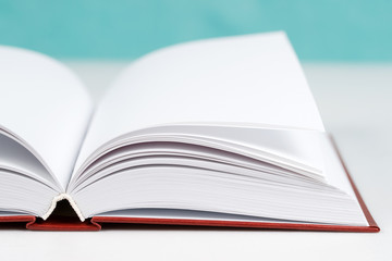 Open book on table. Back to school. Copy space