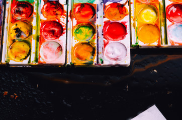 Paint watercolor on black