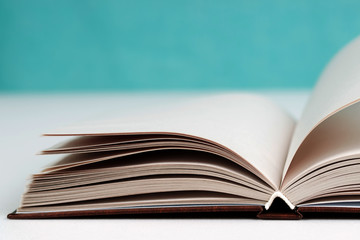 Open book on table. Back to school. Copy space