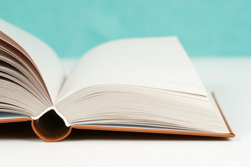 Open book on table. Back to school. Copy space