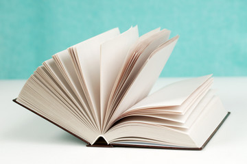 Open book on table. Back to school. Copy space