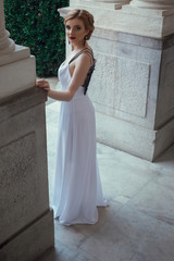 Fototapeta premium Beautiful woman posing long dress in Livadia