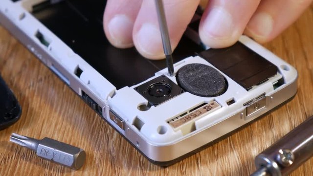 Remove screws with a screwdriver