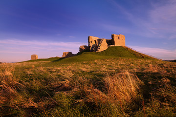 Duffus Castle, Elgin, Moray, Scotland is a ruined stone built motte and bailey fortress first constructed in the 12th century and finally abandoned in 1705.