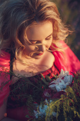 Beautiful provence pregnant woman relaxing in lavender field watching on sunset holding basket with lavanda flowers. Series. alluring girl with purple lavender. blond lady in blossom field