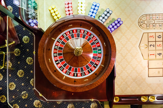 gambling chips on a game table roulette