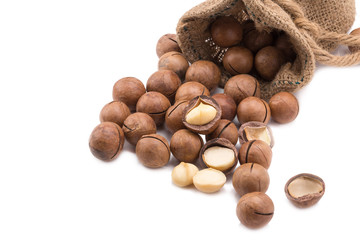 macadamia nut in sack on white background.