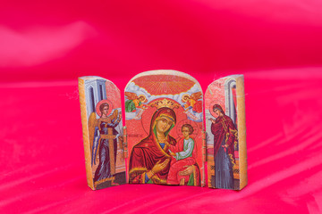 Religious icon on a red background