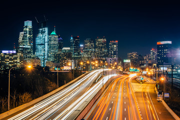 The Philadelphia skyline and Schuylkill Expressway at night, in