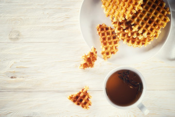 Cup of tea and waffle with space for text