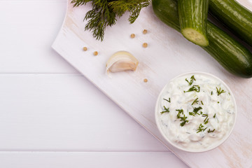 Tzatziki sauce and ingredients.