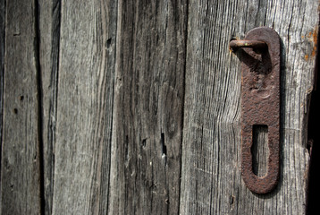 Old door, lock, butterfly
