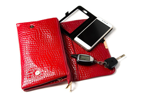 Red Bag, Car Keys And Phone On White Background