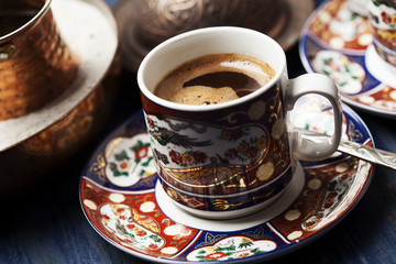 Obraz na płótnie Canvas Turkish coffee made in cezve (traditional coffee pot) 